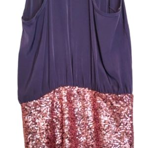 Petite medium sleeveless lavender dress with pink sequin. Perfect for dancing!